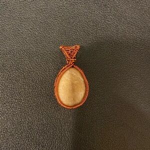 Wire-wrapped quartz pendant